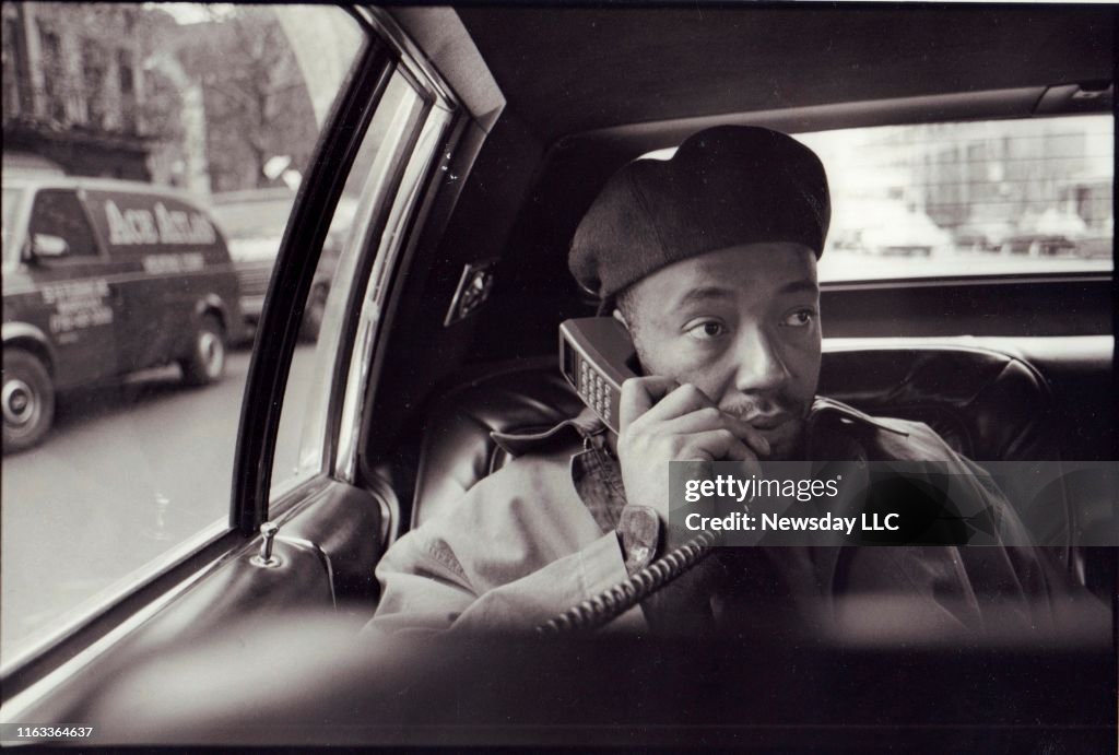 Music mogul Russell Simmons on phone in car in 1991