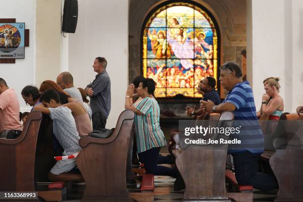 Parishioners pray at the Cathedral of Saint John the Baptist on July 21, 2019 in San Juan, Puerto Rico. As the island is consumed with protesters...