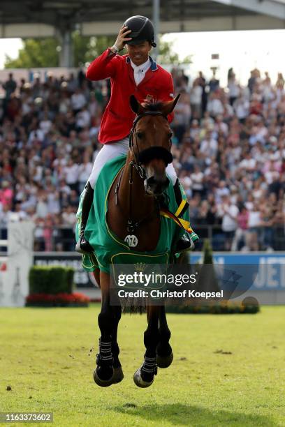 Kent Farrington of United States rides on Gazelle does a lap of honour after winning the Rolex Grand Prix of CHIO Aachen 2019 at Aachener Soers on...