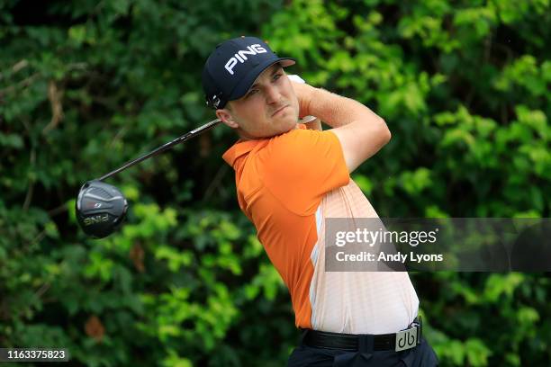 Austin Cook of the United States plays his shot from the third tee during the final round of the Barbasol Championship at Keene Trace Golf Club on...