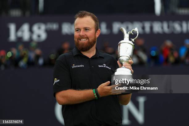 Open Champion Shane Lowry of Ireland celebrates with the Claret Jug on the 18th green during the final round of the 148th Open Championship held on...