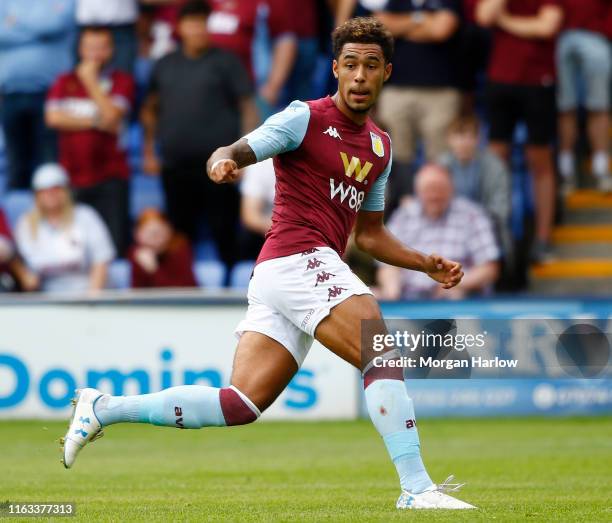 Andre Green of Aston Villa runs with the ball during the Pre-Season Friendly match between Shrewsbury Town and Aston Villa at Montgomery Waters...