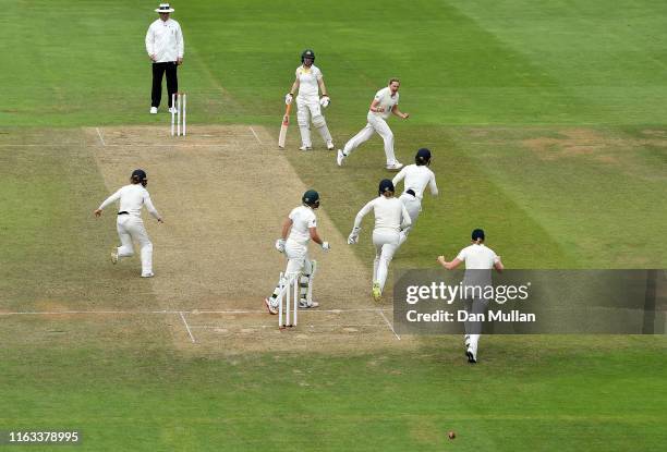 Laura Marsh of England celebrates taking the wicket of Alyssa Healy of Australia during day four of the Kia Women's Test Match between England Women...