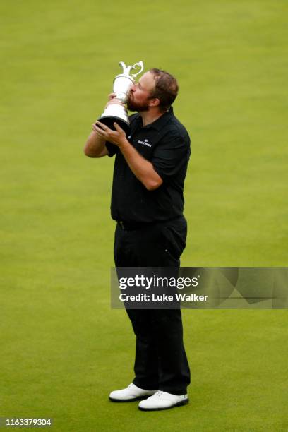 Open Champion Shane Lowry of Ireland celebrates with the Claret Jug on the 18th green during the final round of the 148th Open Championship held on...