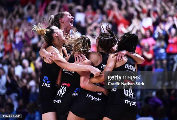 New Zealand players celebrate after winning the Vitality World Cup after the Vitality Netball World Cup Final match between Australia and New Zealand...