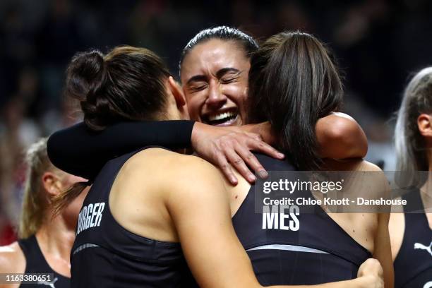 Maria Folau, Karin Burger and Bailey Mes of New Zealand celebrate after winning The Final of The Vitality Netball World Cup between New Zealand and...