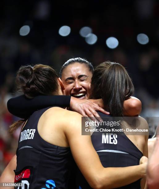 Maria Folau, Karin Burger and Bailey Mes of New Zealand celebrate after winning The Final of The Vitality Netball World Cup between New Zealand and...