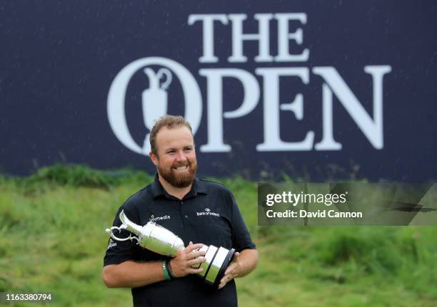 Shane Lowry of Ireland holds with the Claret Jug after his victory during the final round of the 148th Open Championship held on the Dunluce Links at...