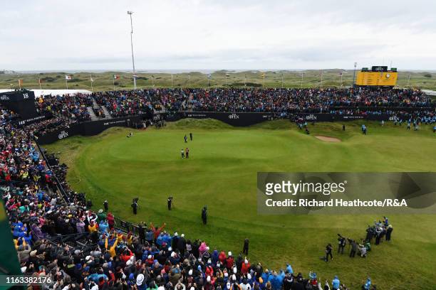 Shane Lowry of Ireland plays a putt on the 18th green to win the championship during final round of the 148th Open Championship held on the Dunluce...