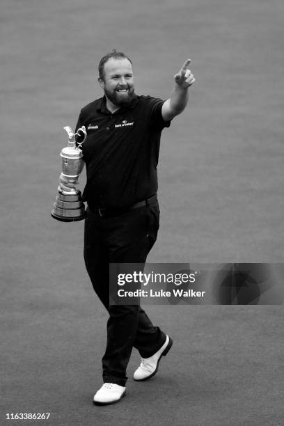 Open Champion Shane Lowry of Ireland celebrates with the Claret Jug on the 18th green during the final round of the 148th Open Championship held on...