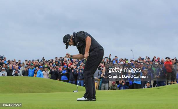 Shane Lowry of Ireland celebrates making a birdie on the 15th hole during the final round of the 148th Open Championship held on the Dunluce Links at...