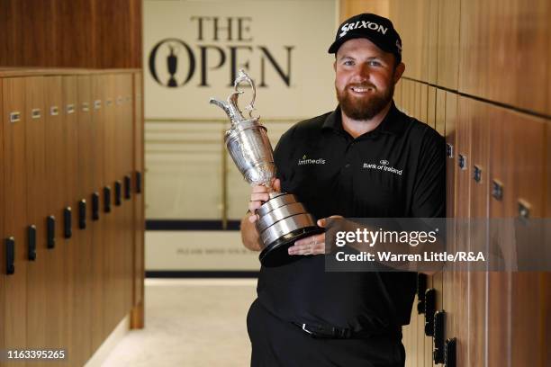 Shane Lowry of Ireland, Champion Golfer of The Year 2019 pose for a photo with the Claret Jug following his victory of the 148th Open Championship...