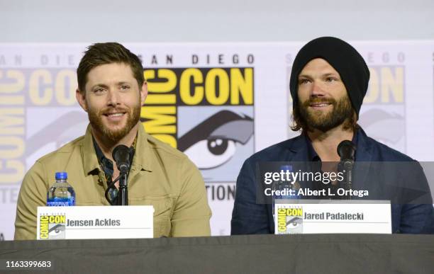 Jensen Ackles and Jared Padalecki speak at the "Supernatural" Special Video Presentation and Q&A during 2019 Comic-Con International at San Diego...