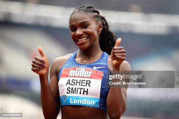 Dina Asher-Smith of Great Britain reacts after the Women's 100m Final during Day Two of the Muller Anniversary Games IAAF Diamond League event at the...