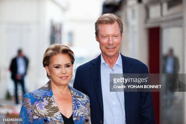 Grand Duke Henri of Luxembourg and Grand Duchess Maria Teresa of Luxembourg arrive at the restaurant Le comptoir de Brice during the 12th Francophone...