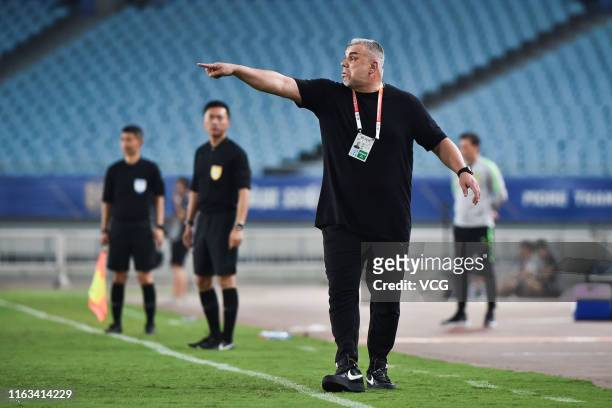 Head coach Cosmin Olaroiu of Jiangsu Suning gestures during the 19th round match of 2019 Chinese Football Association Super League between Jiangsu...