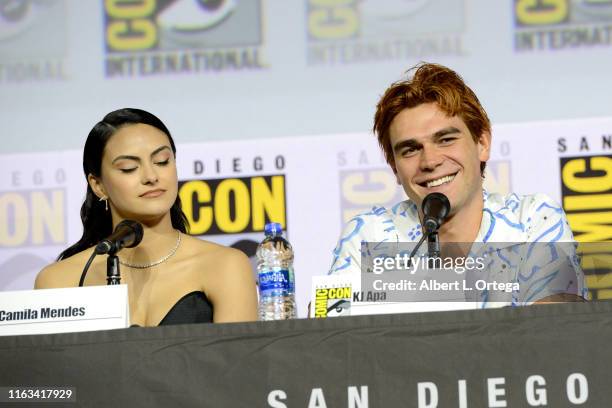 Camila Mendes and KJ Apa speak at the "Riverdale" Special Video Presentation and Q&A during 2019 Comic-Con International at San Diego Convention...