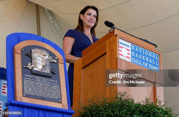 Brandy Halladay speaks on behalf of her late husband, Roy Halladay, during the Baseball Hall of Fame induction ceremony at Clark Sports Center on...