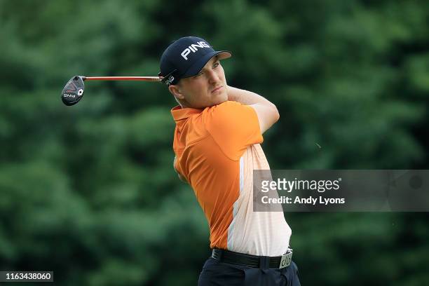 Austin Cook of the United States plays a shot on the 11th hole during the final round of the Barbasol Championship at Keene Trace Golf Club on July...