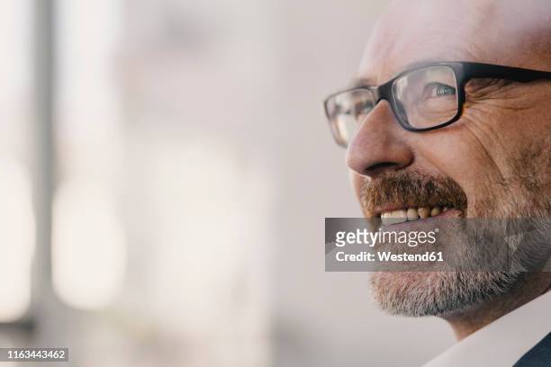 portrait of confident mature businessman - looking away stock pictures, royalty-free photos & images