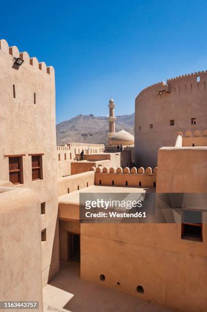 tower of the fort, nizwa, oman - nizwa fotografías e imágenes de stock