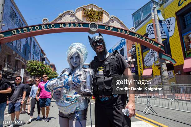 Cosplayers Jasmine Honaker as Mrs. Freeze and Steve Welsh as Batman from "Batman" pose outside 2019 Comic-Con International on July 21, 2019 in San...