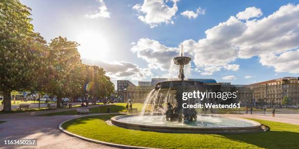 palace square with fountain in front of koenigsbau, stuttgart, germany - stuttgart stock pictures, royalty-free photos & images