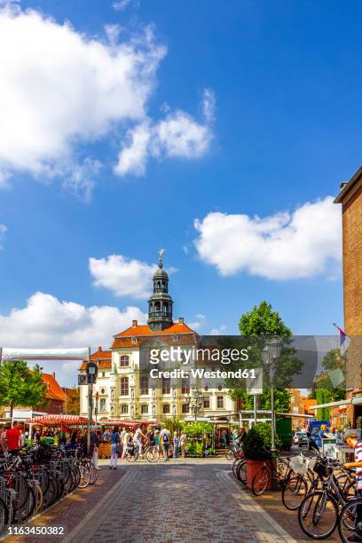view to townhall with weekly market in the foreground, lueneburg, germany - market square stock pictures, royalty-free photos & images