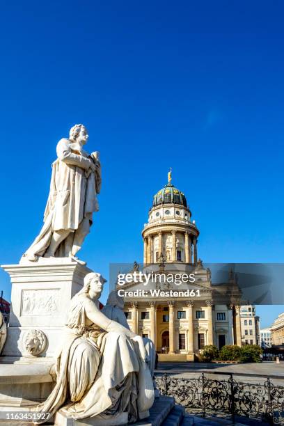 view to french cathedral with schiller monument in the foreground, gendarmenmarkt, berlin, germany - gendarmenmarkt stock pictures, royalty-free photos & images