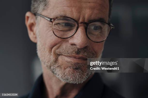 portrait of confident mature businessman - face stubble stock pictures, royalty-free photos & images