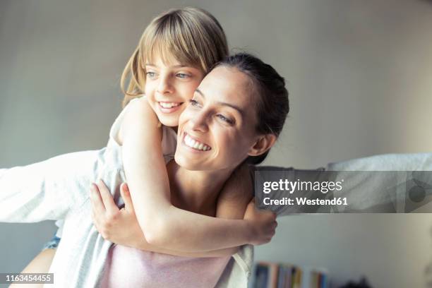 mother and daughter playing at home, pretending to fly - child arms up stock pictures, royalty-free photos & images