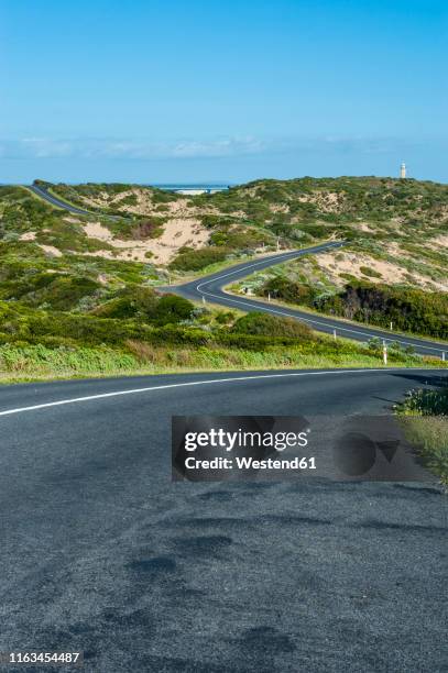 road bend on cape jaffa, south australia, australia - coastal road stock pictures, royalty-free photos & images