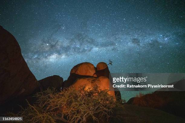 milky way and rock arch at the spitzkoppe, namibia - night safari stock pictures, royalty-free photos & images