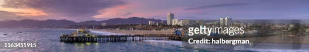 drone panorama of santa monica at sunset - santa monica los ángeles stock pictures, royalty-free photos & images