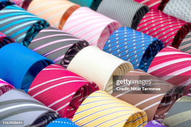 colorful of neckties set in men shop. - ties foto e immagini stock