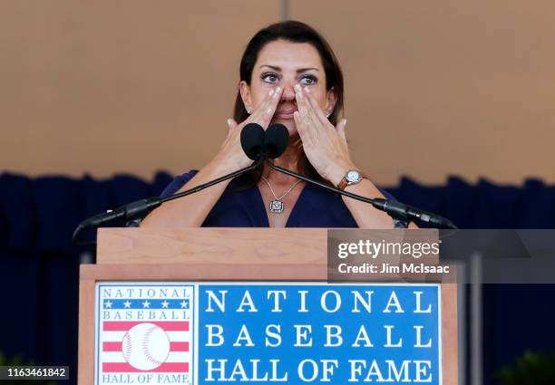 Brandy Halladay speaks on behalf of her late husband, Roy Halladay, during the Baseball Hall of Fame induction ceremony at Clark Sports Center on...