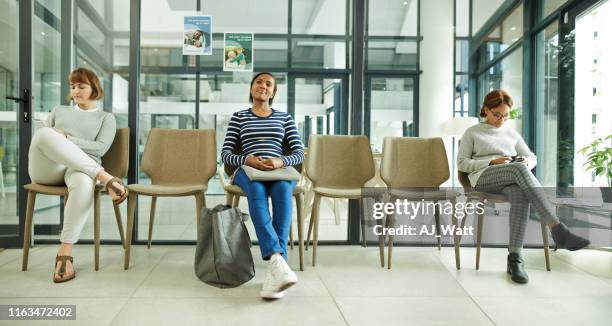 it doesn't feel like a wait with complementary wifi - chairs in a row stock pictures, royalty-free photos & images