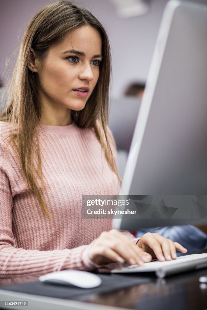 Young Female Student Learning On A Class At Computer Lab High-Res Stock ...