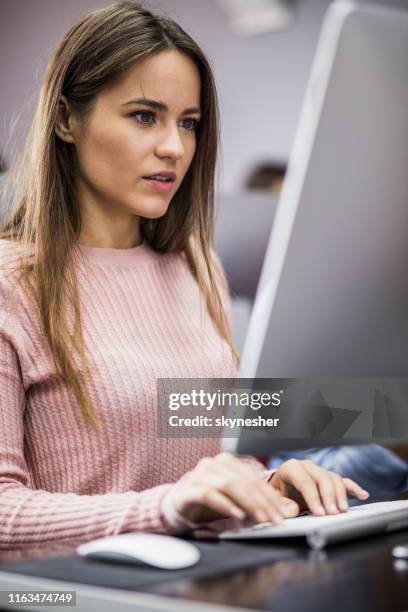 Computing Lab Female Student Young Female Student Learning On A Class At Computer Lab High-Res Stock ...