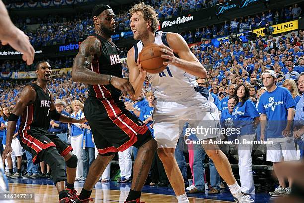 Dirk Nowitzki of the Dallas Mavericks moves the ball against LeBron James of the Miami Heat in Game Five of the 2011 NBA Finals on June 9, 2011 at...