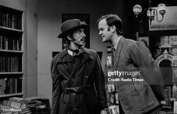 Comedians Eric Idle and John Cleese in a sketch from the BBC television show 'Monty Python's Flying Circus', circa 1970.