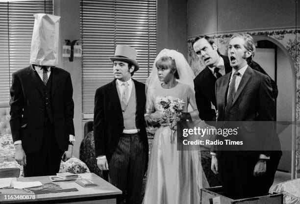 Comedians Graham Chapman , Terry Jones, Carol Cleveland, John Cleese and Eric Idle in the 'Buying a Bed' sketch from series 1 of the BBC television...