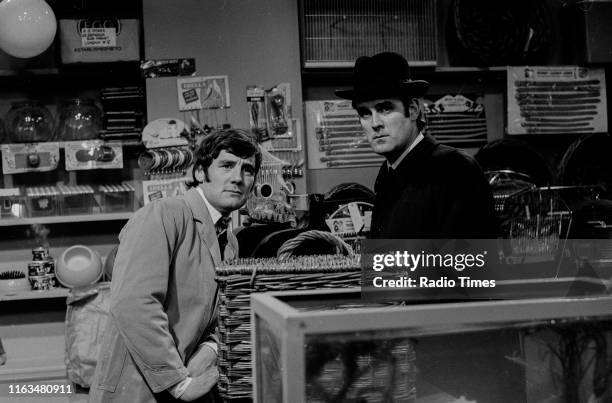 Comedians Michael Palin and John Cleese in the 'Dead Parrot' sketch from series 1 of the BBC television show 'Monty Python's Flying Circus', 1969.