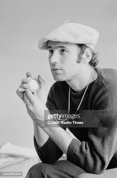 Writer Neil Innes in a script conference for BBC television show 'Monty Python's Flying Circus', 1974.