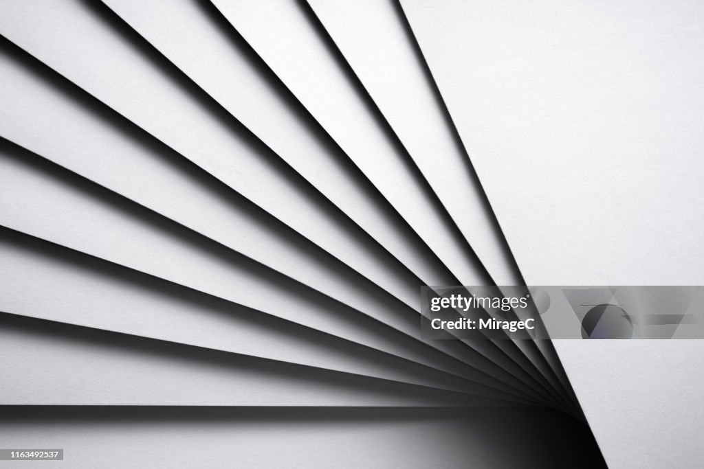 Monochrome White Stacking Paper Fanned Out