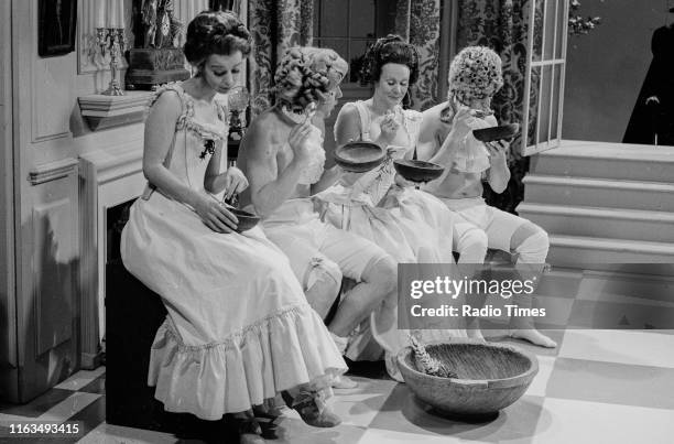 Comedians Connie Booth, Michael Palin, Carol Cleveland and Terry Jones in the 'Dennis Moore' sketch from series 3 of the BBC television show 'Monty...