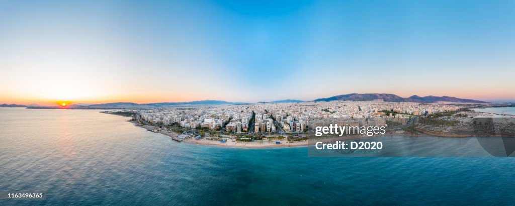 Panoramic aerial photo of faliro beach, athens, greece, at summer during sunset