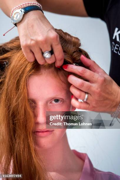 Model is seen backstage ahead of the Annette Goertz Fashion Show Spring-Summer 2020 at Langen Foundation on July 20, 2019 in Neuss, Germany.