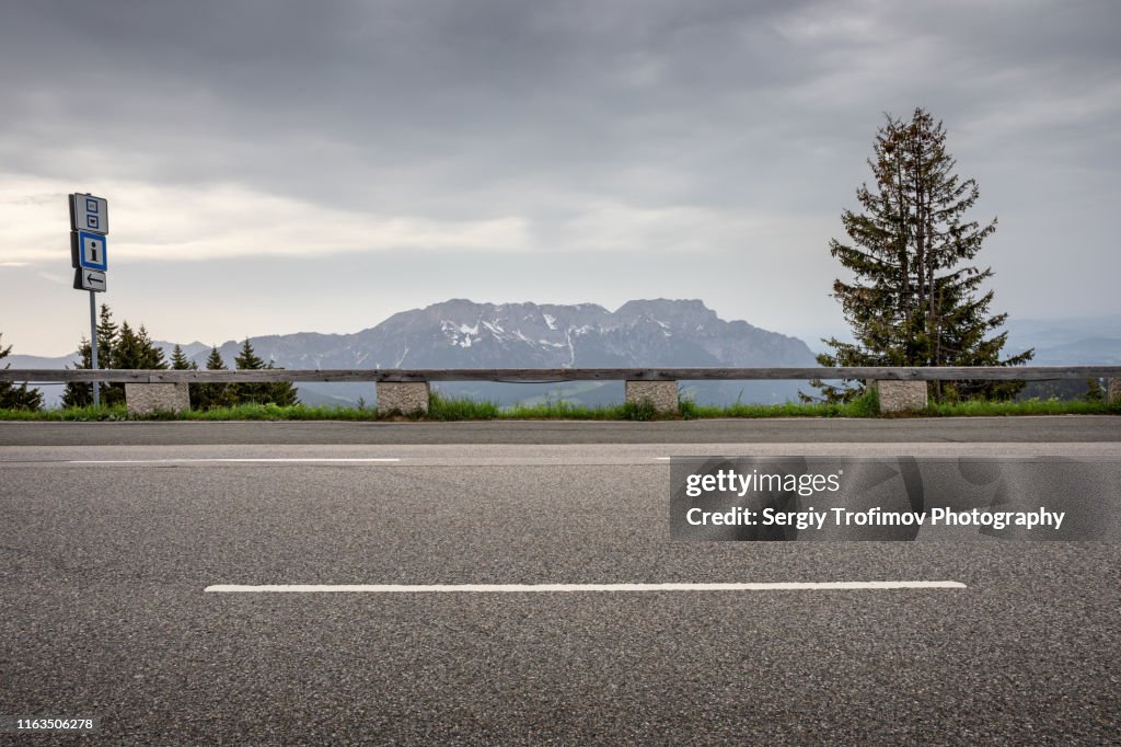 Empty road on mountain pass side view