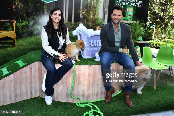 Actress Ela Velden and Actor Patricio Borghetti poses for photos during a press conference to launching of dog food 'Extra Life' of Dog Chow at...